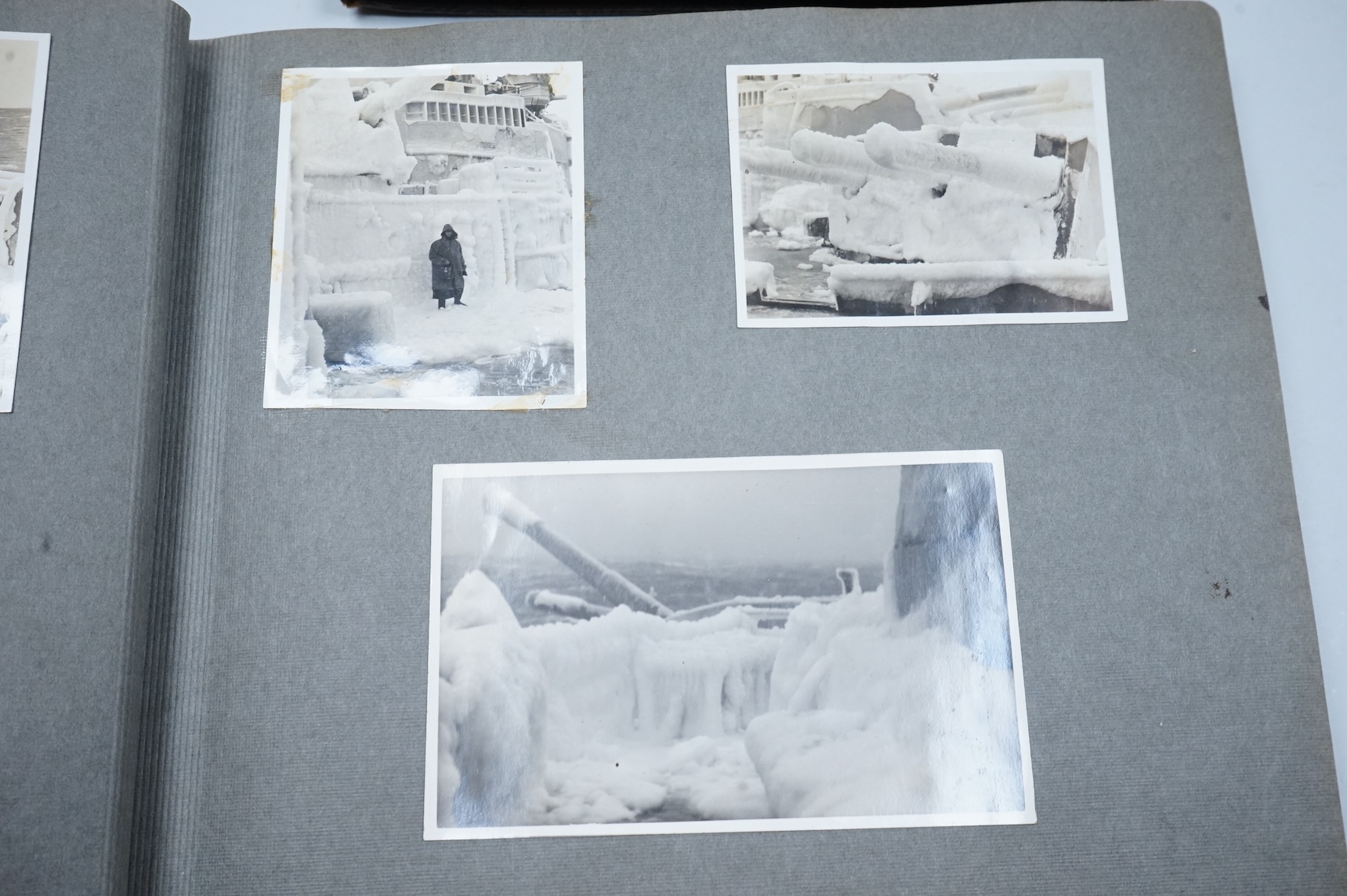 Two WWII naval photo albums, containing an archive of 1940s photographs of the Russian convoy in the Barents Sea, a ship’s concert at Scarpa Flow, a variety of Royal Naval vessels and some aircraft, images aboard HMS Peg